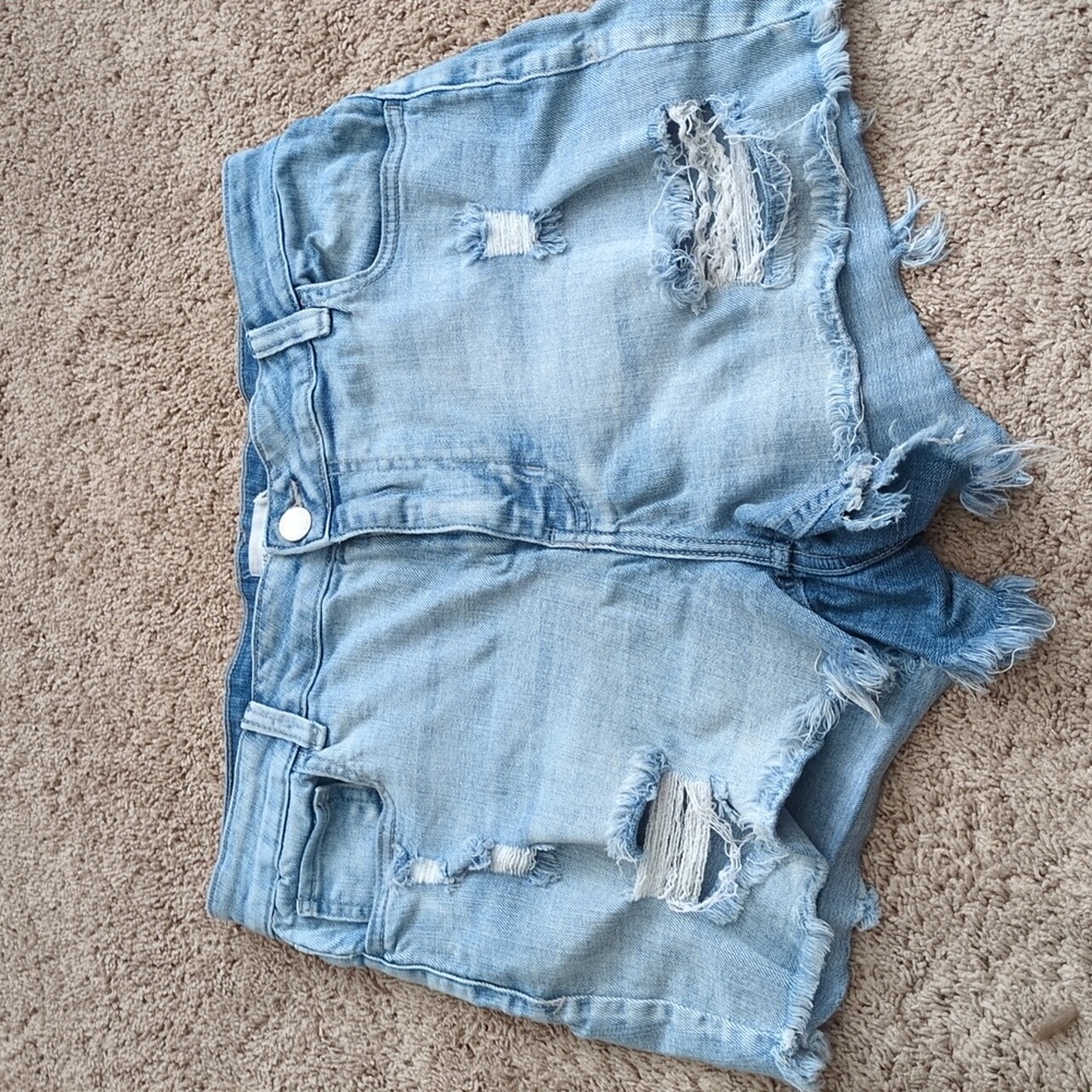 Distressed denim shorts